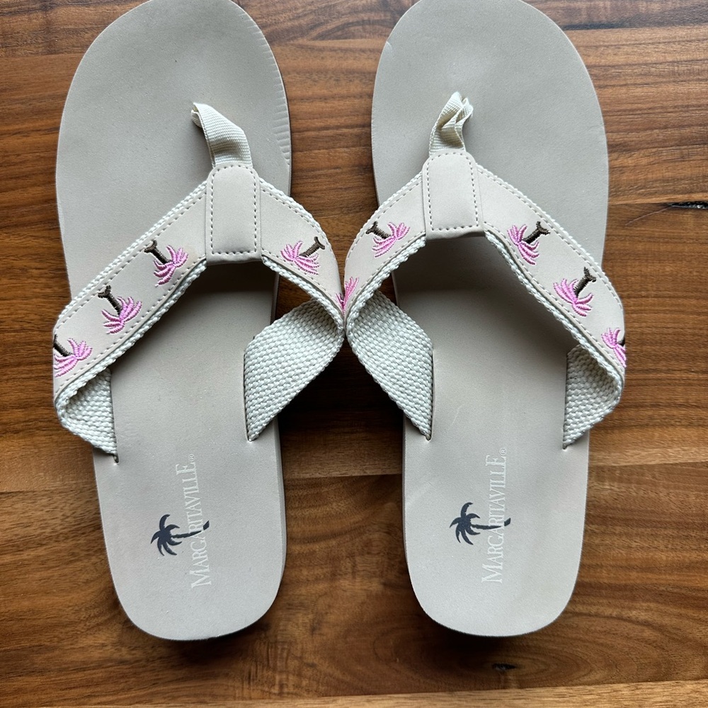 Margaritaville (Jimmy Buffet) Sand and Beige Flip Flops. Never Worn.